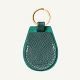 Luxury leather AirTag holder in dark green  poppy green leather-backview, by Laelaps Paris 