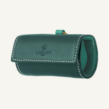 Green leather dog waste bag holder with gold hardware by Laelaps Paris