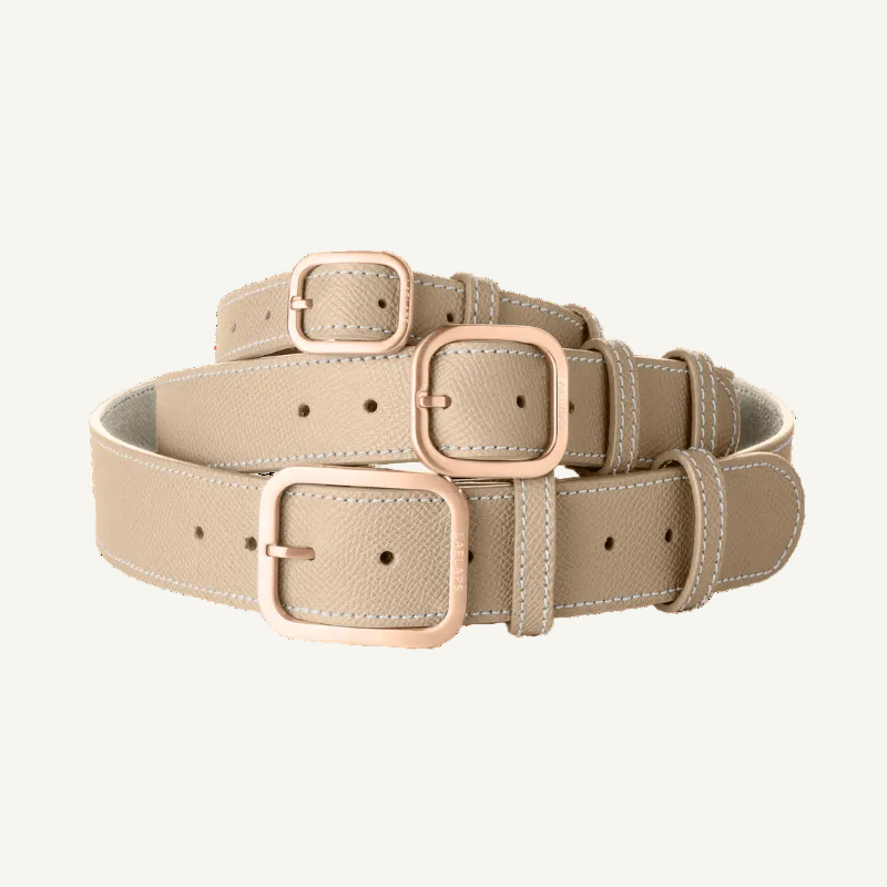 3 Laelaps Paris collars in taupe with rose gold hardware. 