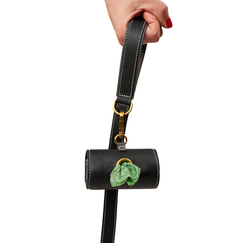 Matching black leather  leash and waste bag holder set with gold hardware, made from embossed calf leather by Laelaps Paris 