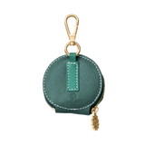Green treat bag with gold hardware 