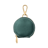 Green treat bag with gold hardware 