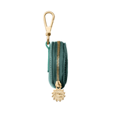 Green treat bag with gold hardware 