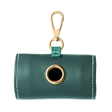 Green leather dog waste bag holder with gold hardware by Laelaps Paris