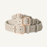 3 Laelaps Paris collars in light grey  with rose gold hardware. 