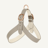 Taupe leather harness with off white accents and rose mat gold hardware by Laelaps Paris. 