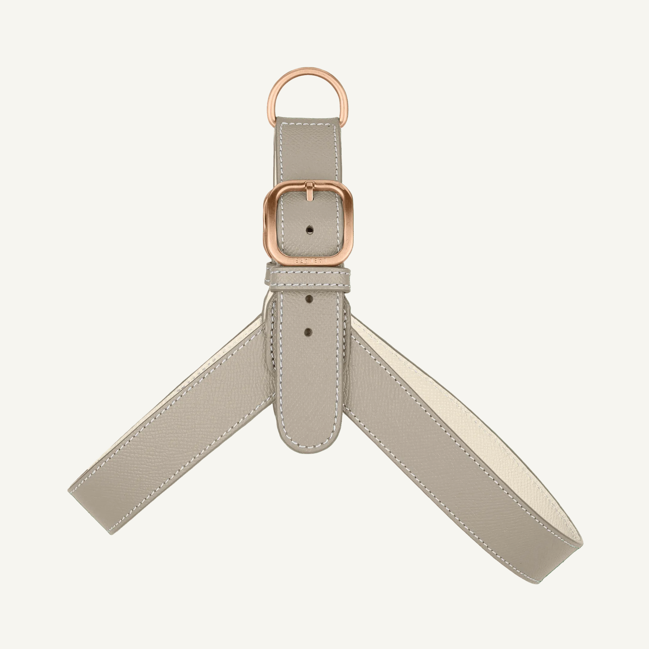 Taupe leather harness with off white accents and rose mat gold hardware by Laelaps Paris. 