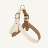 Off white leather harness with powder accents and rose mat gold hardware by Laelaps Paris. 
