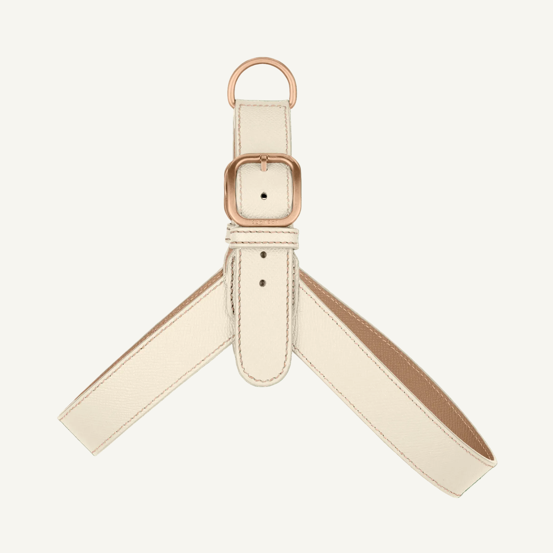 Off white leather harness with powder accents and rose mat gold hardware by Laelaps Paris. 
