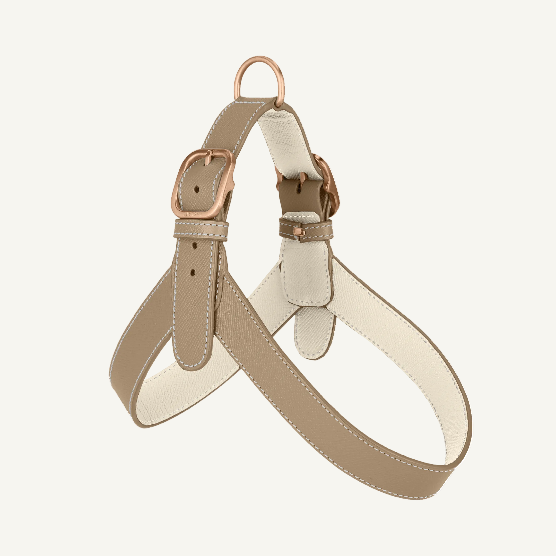 Taupe leather harness with off white accents and rose mat gold hardware by Laelaps Paris. 
