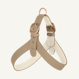 Taupe leather harness with off white accents and rose mat gold hardware by Laelaps Paris. 