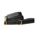 Black leather dog leash with gold hardware by Laelaps Paris