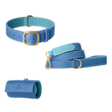 Blue leather dog collar, leash and poop bag holder set with light blue lining and gold hardware from Laelaps Paris