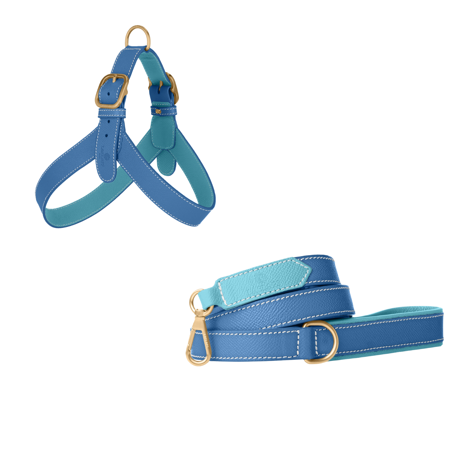 Royal blue embossed calf leather dog harness and matching leash with light blue lining, white stitching and matte gold buckles by Laelaps Paris