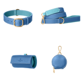 Complete blue leather dog walking set by Laelaps Paris: collar, leash, poop bag holder and round zip treat pouch with gold clasp