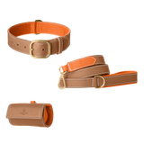 Camel leather dog collar, leash and poop bag holder set with orange lining and gold hardware from Laelaps Paris