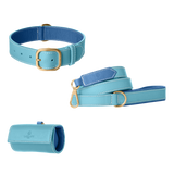 Light blue leather dog collar, leash and poop bag holder set with blue lining and gold hardware from Laelaps Paris