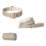Light grey leather dog collar, leash and poop bag holder set with ivory lining and rose gold hardware from Laelaps Paris