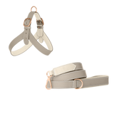 Light grey embossed calf leather dog harness and matching leash with off-white lining, white stitching and matte rose gold buckles by Laelaps Paris