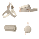 Complete light grey leather dog walking set by Laelaps Paris: harness, leash, poop bag holder and round zip treat pouch with rose gold clasp