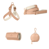 Complete powder pink leather dog walking set by Laelaps Paris: harness, leash, poop bag holder and round zip treat pouch with rose gold clasp