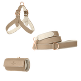 Taupe leather dog harness, leash and poop bag holder set with off-white lining and matte rose gold hardware from Laelaps Paris